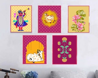 May include: Five framed prints with a pink and yellow color scheme. The prints feature a variety of Indian-inspired designs, including a deity, cows, flowers, and geometric patterns.