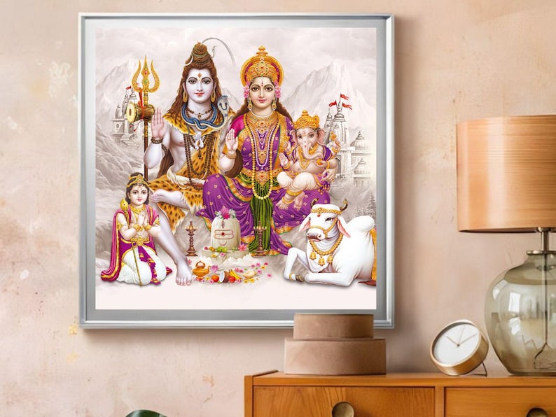 May include: A colorful painting depicting Hindu deities Shiva, Parvati, and Ganesha. Shiva is shown with a third eye and a snake around his neck. Parvati is wearing a purple and gold sari. Ganesha is sitting on a white bull. The painting is set against a background of mountains and clouds.
