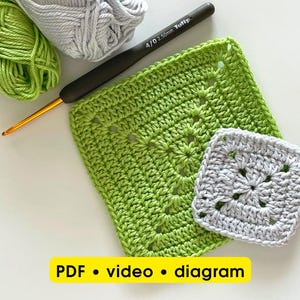 May include: A close-up of crochet supplies, including a green and gray yarn, a crochet hook, and two crocheted squares. The squares are in light green and gray. The text "PDF • video • diagram" is at the bottom.