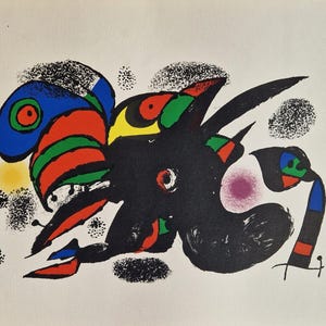May include: Abstract art print featuring a black, bird-like figure with colorful accents. The artwork includes a blue, red, green, and yellow palette, with black and white speckled details. A vibrant piece for wall decor.