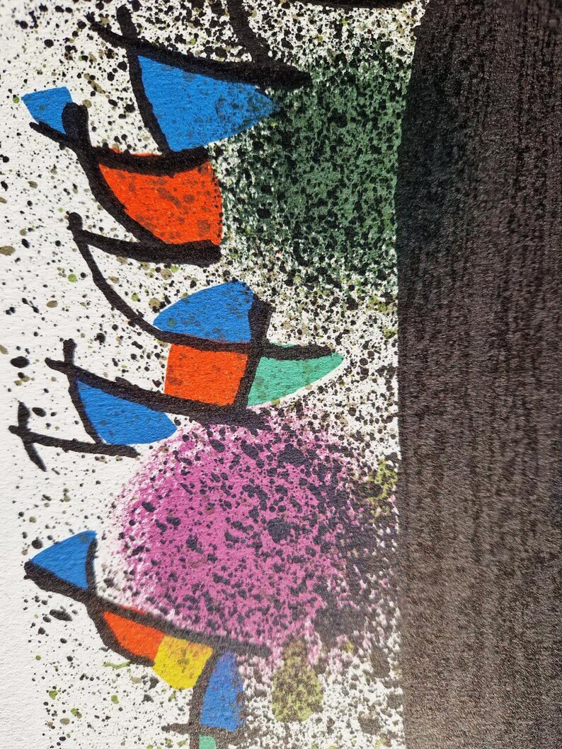 May include: Abstract art print featuring colorful shapes and splatters. The artwork includes blue, orange, green, and yellow geometric forms against a white background with black splatters. A large black shape is on the right side of the image.