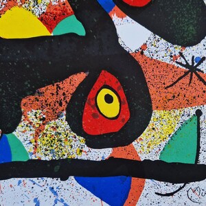 May include: Abstract painting with black, red, yellow, green, and blue shapes on a white background. The painting is signed "Mir&oacute;" in the lower right corner.