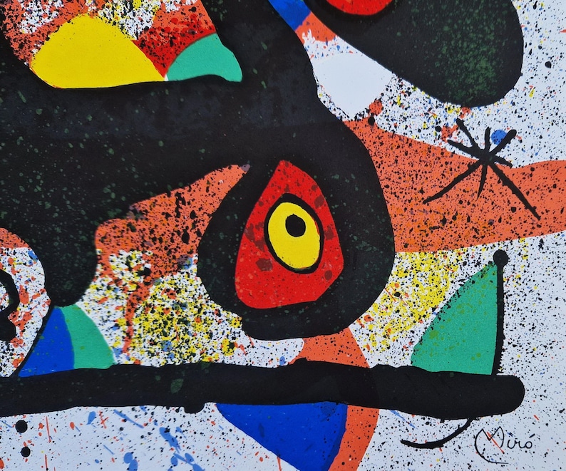 May include: Abstract painting with black, red, yellow, green, and blue shapes on a white background. The painting is signed "Mir&oacute;" in the lower right corner.