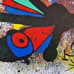 May include: Abstract painting with a black, red, blue, and green bird-like figure on a white background with black, red, blue, green, and yellow splatters of paint.