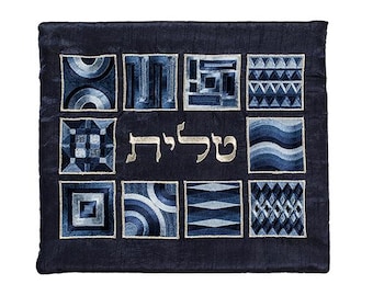 May include: A blue velvet prayer shawl with a Hebrew inscription and geometric patterns in shades of blue.