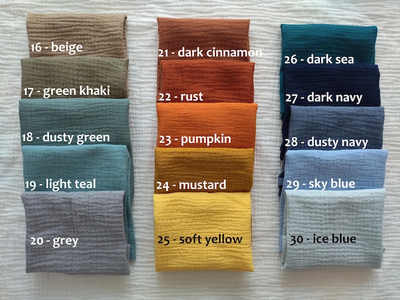 May include: A collection of fifteen folded fabric swatches arranged in three columns, each labeled with a number and color name: 16-beige, 17-green khaki, 18-dusty green, 19-light teal, 20-grey, 21-dark cinnamon, 22-rust, 23-pumpkin, 24-mustard, 25-soft yellow, 26-dark sea, 27-dark navy, 28-dusty navy, 29-sky blue, and 30-ice blue.