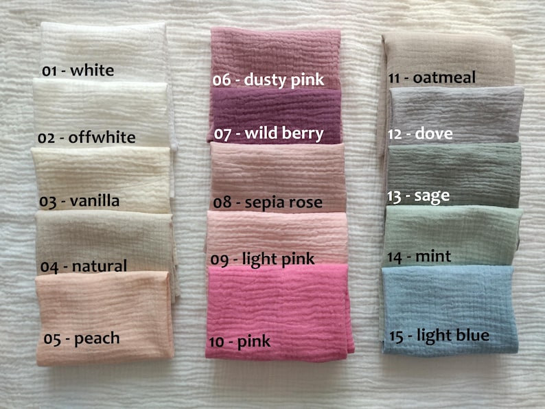 May include: A collection of fifteen folded fabric swatches arranged in three columns, each labeled with a number and color name: 01 white, 02 offwhite, 03 vanilla, 04 natural, 05 peach, 06 dusty pink, 07 wild berry, 08 sepia rose, 09 light pink, 10 pink, 11 oatmeal, 12 dove, 13 sage, 14 mint, and 15 light blue.