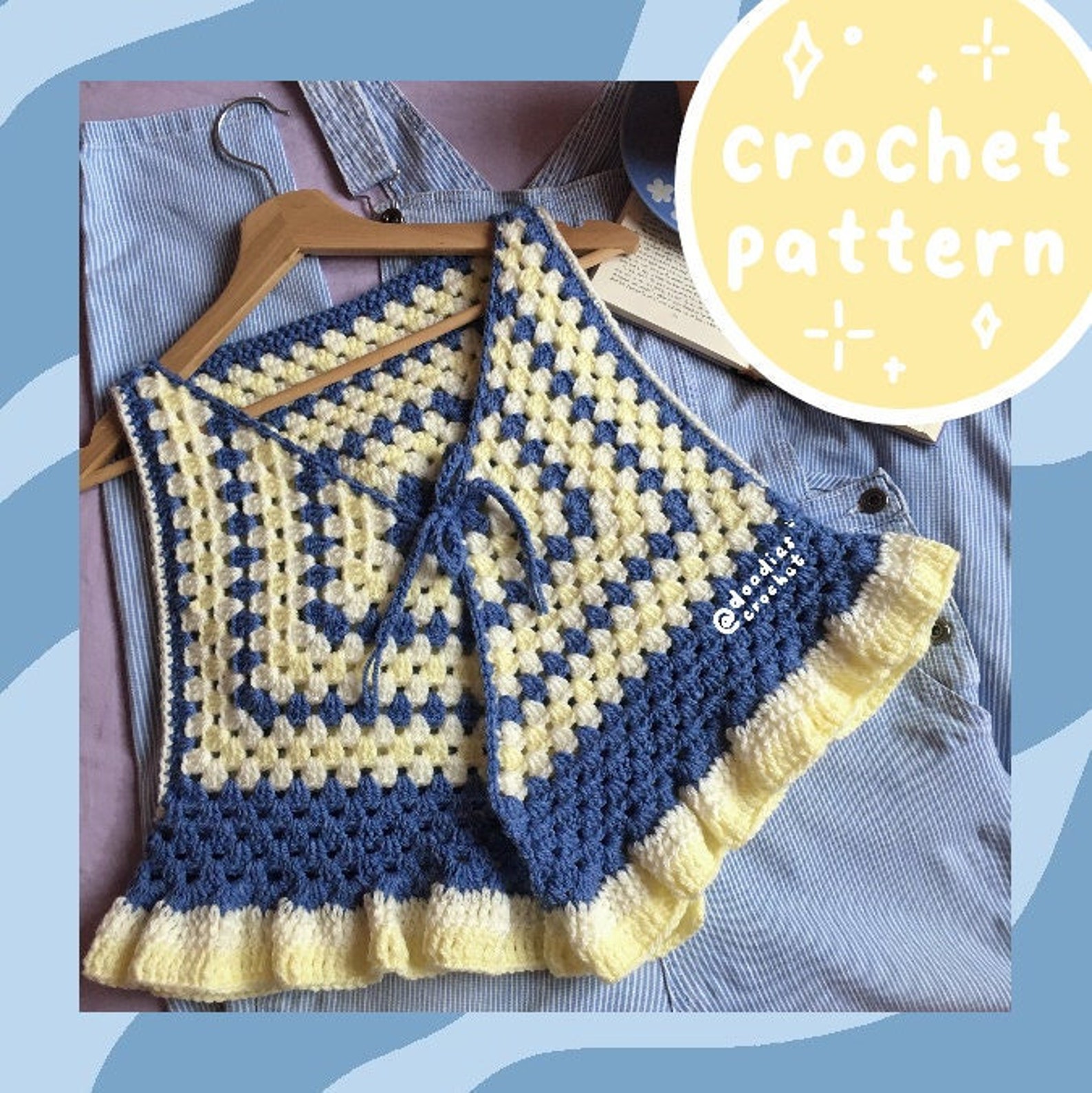 A small blue and yellow vest or waistcoat. It is a granny square striped pattern with ruffles along the bottom edge.