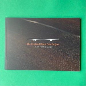May include: A black and white image of a bridge with the text "The Fenland Black Oak Project" and "A Table for the Nation" below it.