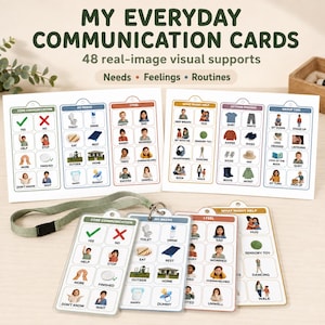 May include: A set of My Everyday Communication Cards featuring 48 real-image visual supports for needs, feelings, and routines. The collection includes two large rectangular reference sheets and four smaller laminated cards attached to a green lanyard.