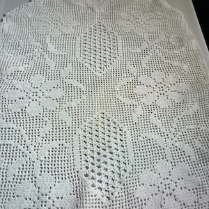 Hand crocheted tablecloth in white, crocheted in Sweden
