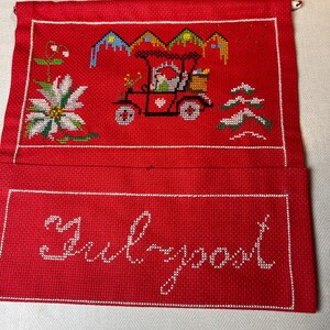 Een prachtig handgeborduurd zakje voor kerstpost / julpost