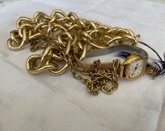 This is a 1/2 pound lot of broken and not, vintage and newer craft jewelry. The majority of these are wearable or for craft Golden tones