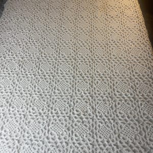 Hand crocheted cloth from Sweden, in white