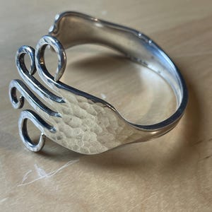 A very beautiful and unusual bracelet made from  A hand bent fork made into a bracelet, from Sweden