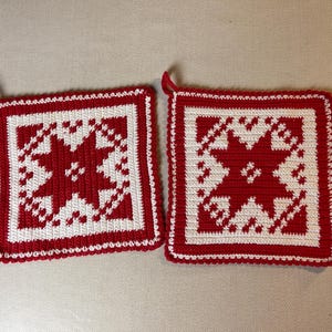 Beautifully hand-crocheted potholders in Christmas colors red and white