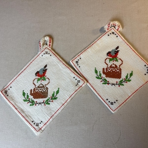 Hand embroidered pot holders, from Sweden