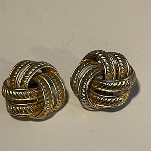 Vintage clip on earrings in golden tones