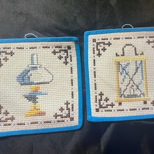 Hand embroidered pot holders, from Sweden