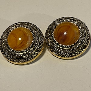 Vintage clip on earrings in golden tones