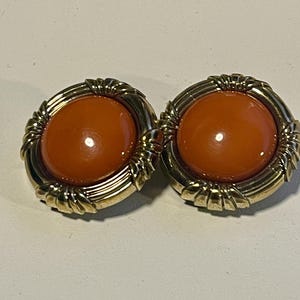 Vintage clip on earrings in golden tones