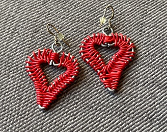 Cute red earrings in the shape of a heart, from Sweden