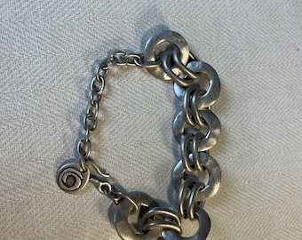 A very nice bracelet that is silver colored