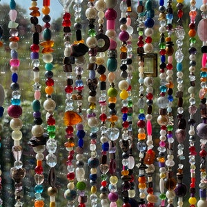 Bohemian strands of beads to make eg curtains gemstones glass sun catcher. Choose how many strands you want under options appr: 100 cm/40&quot;