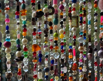 Bohemian strands of beads to make eg curtains gemstones glass sun catcher. Choose how many strands you want under options appr: 100 cm/40"