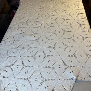 Beautiful hand crocheted tablecloth in white. Hand crocheted in Sweden