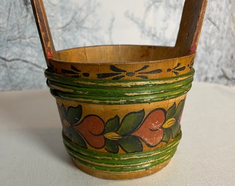 Beautiful older hand-painted wooden pot.    It is old and therefore has traces of age