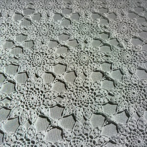 Beautiful white hand crocheted tablecloth from Sweden