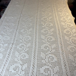 Hand crocheted tablecloth in white, crocheted in Sweden