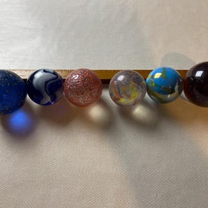 Larger glass marble Glass marbles in a larger size. Select yours under options !
