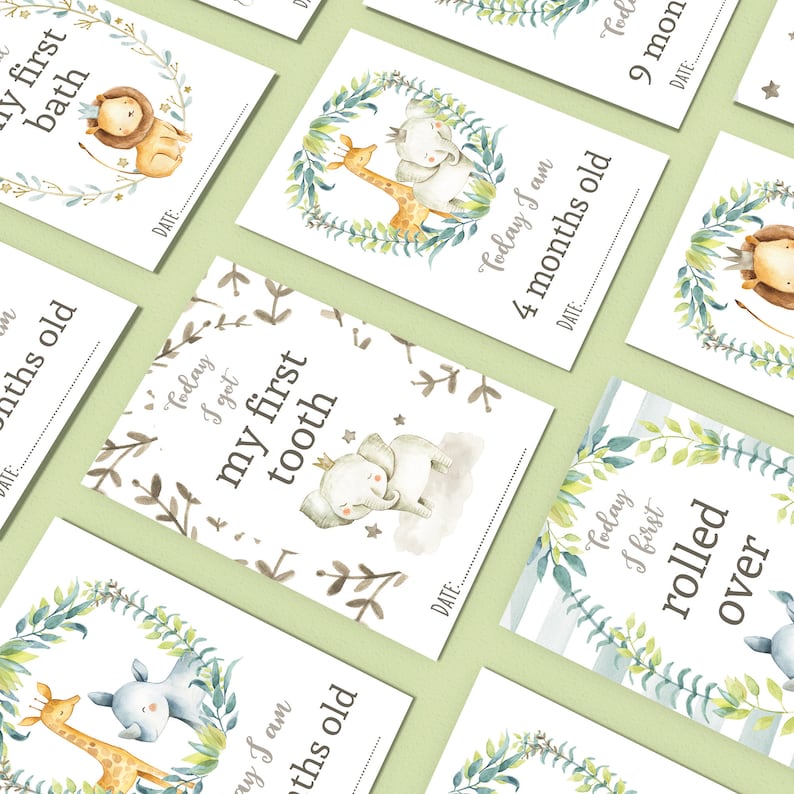May include: A set of ten printable baby milestone cards featuring watercolor illustrations of animals in a leafy wreath. The cards include milestones such as "Today I got my first tooth", "Today I am 4 months old", and "Today I first rolled over".