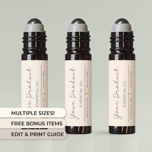 May include: Three brown glass roller bottles with black labels and silver roller balls. The labels have the text "Your Product" and "Essential Oil" printed in black. The bottles are labelled "Organic & Natural" and "Net. 4oz / 120ml".
