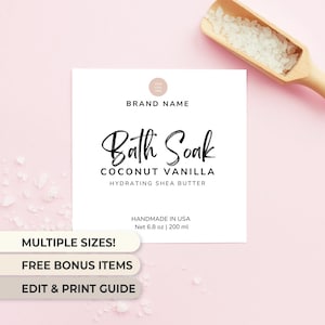 May include: White label with black text that reads "BRAND NAME", "Bath Soak", "COCONUT VANILLA", "HYDRATING SHEA BUTTER", "HANDMADE IN USA", "Net 6.8 oz | 200 ml", "MULTIPLE SIZES!", "FREE BONUS ITEMS", and "EDIT & PRINT GUIDE".