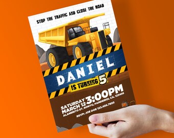May include: A yellow construction truck with a black and yellow striped sign that says "Stop the traffic and close the road". The sign also says "Daniel is turning 5" and includes the date and time of the party. The background is a brown brick wall.