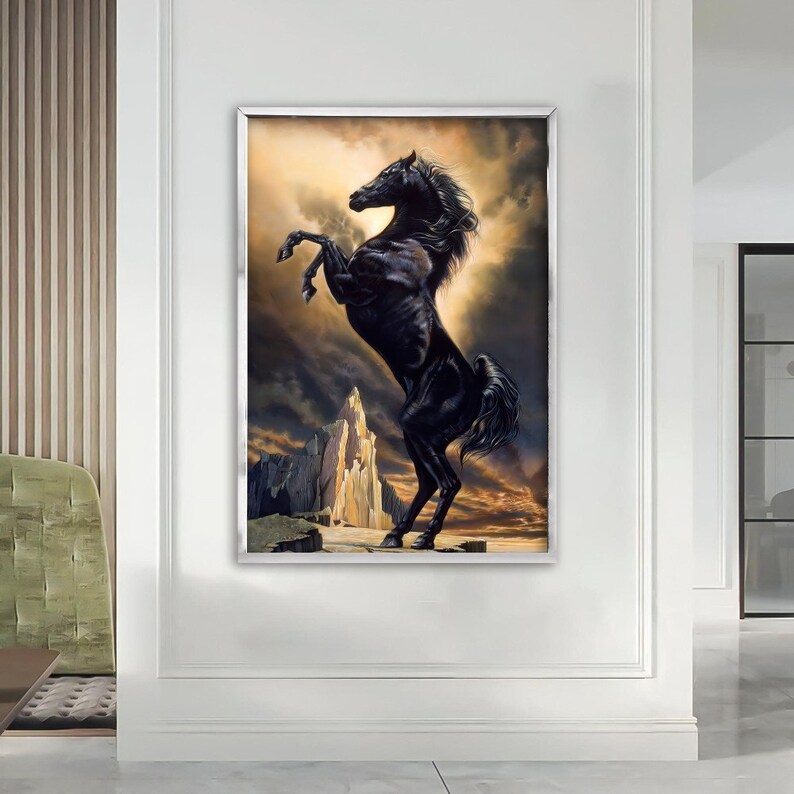 May include: A black horse rearing up on its hind legs against a dramatic, stormy sky backdrop. The horse is silhouetted against a bright, golden light, creating a striking contrast.