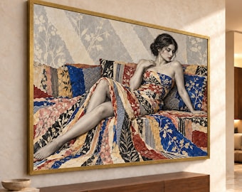 May include: A rectangular wall art piece in a gold frame depicting a person with dark hair reclining on a surface covered in a patchwork quilt. The quilt features a mix of blue, red, and cream fabric panels with floral and geometric patterns.