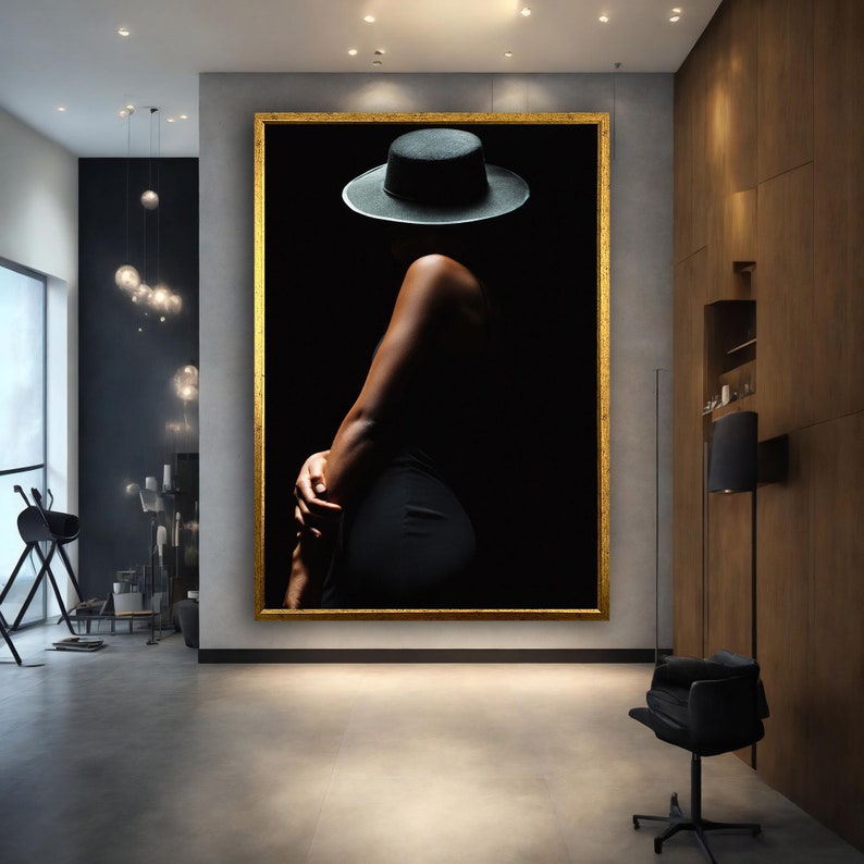 May include: A black and white photograph of a person wearing a black hat and a black dress. The person is standing in a dark room and is looking away from the camera.