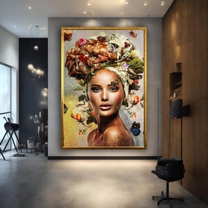 May include: A portrait of a woman wearing a colourful floral headwrap with butterflies. The woman has brown skin, dark eyes, and a neutral expression. The background is a soft, muted blue with hints of green and yellow.