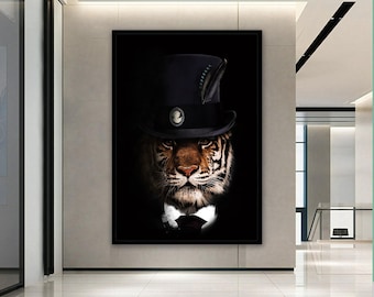 May include: A tiger wearing a black top hat with a feather and a bow tie. The tiger is looking directly at the viewer. The background is black.
