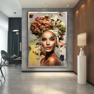 May include: A woman with a colourful floral headwrap and butterflies around her. The background is a soft, abstract design with muted colours.