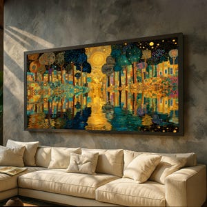 May include: A large framed art print showing an abstract landscape with a reflective water feature. The artwork uses gold, blue, and teal tones to depict trees and buildings. The print is displayed above a beige sofa, adding a touch of colour.