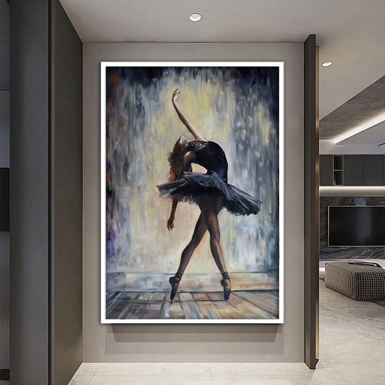 May include: A painting of a ballerina in a black tutu and pointe shoes, performing a graceful pose against a blurred background of soft colors.