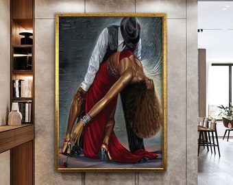 May include: A painting of a couple dancing. The man is wearing a black hat and a white shirt. The woman is wearing a red dress. The painting is set against a dark background.