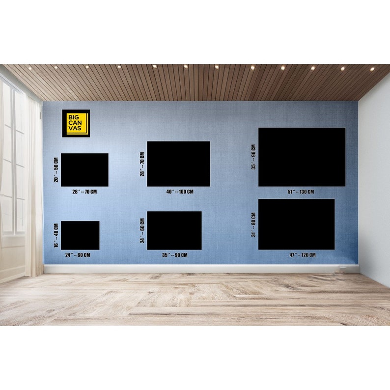 May include: A wall with different sized black canvas prints, with measurements in centimeters, for sale. The text "BIG CANVAS" is in a yellow box on the wall.