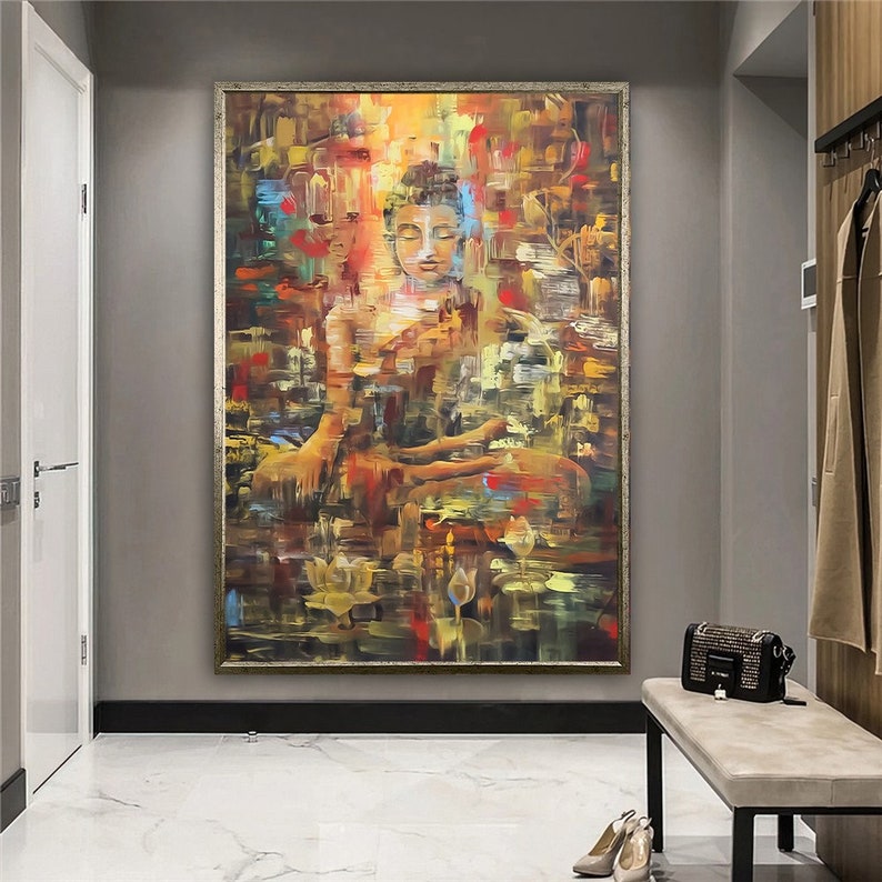 May include: A colorful abstract painting of a meditating Buddha figure in a seated position. The painting features a mix of warm and cool colors, including yellow, orange, red, blue, and green. The Buddha is depicted with a serene expression and closed eyes.