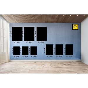 May include: A wall with a variety of black canvas prints in different sizes. The prints are arranged in a grid pattern. The largest print is 40 by 100 centimeters, and the smallest print is 16 by 40 centimeters.